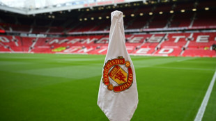 Man Utd raise profit forecast despite turbulent season