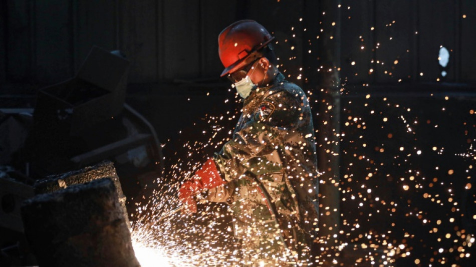 China's manufacturing shrinks in April as trade war bites