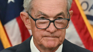 Stocks torn between Fed rate warning, AI optimism