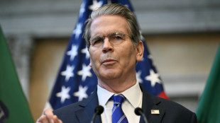 Stocks fluctuate as traders weigh China-US row, tech earnings