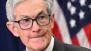 US Fed chair leaves door open to rate cut, facing down Trump pressure