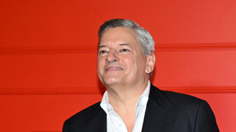 Netflix boss promises Warner Bros films would still be seen in cinemas