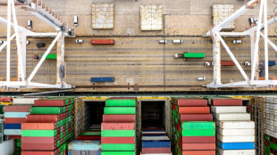 Dollar, stocks hit and gold hits record as trade war panic returns