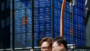 Stocks slip in cautious trading, oil turns higher
